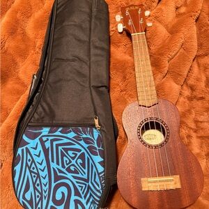 Brown Ukulele with Black and Blue Bag